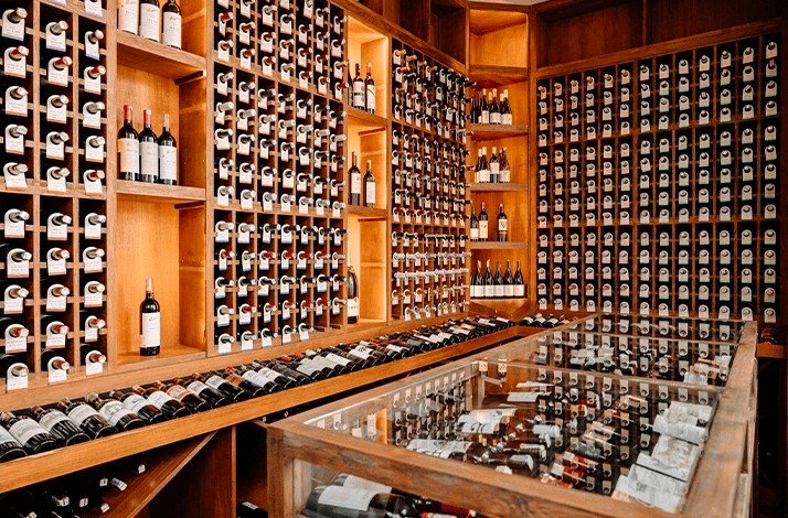 Racks with various bottles of wine at Merah Putih.