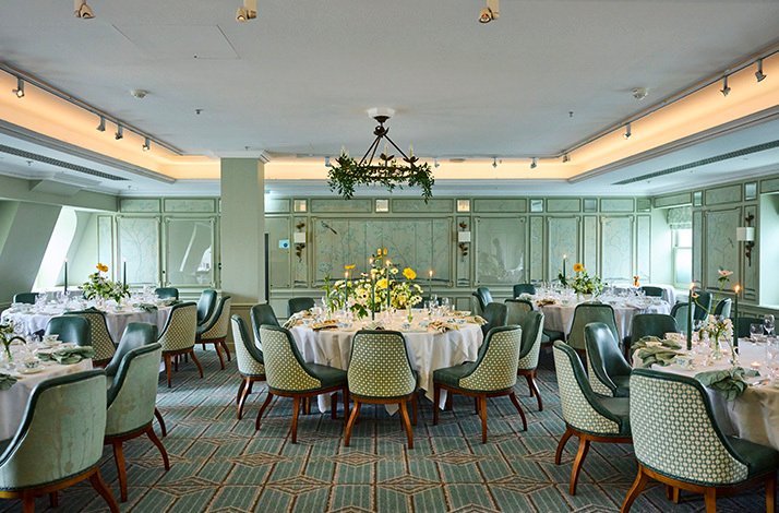 The Fortnum & Mason Diamond Jubilee Tea Salon set up with multiple dining tables.