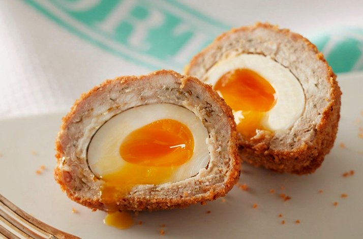 A perfect scotch egg prepared in a masterclass guided by expert chefs at Fortnum & Mason.