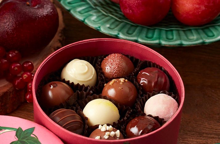 A box of assorted flavours of chocolates from Fortnum & Mason.