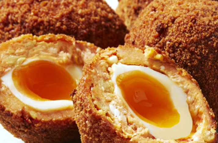 A perfect scotch egg prepared in a masterclass guided by expert chefs at Fortnum & Mason.