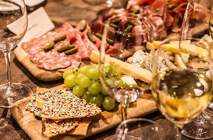 Appetizers and wine glasses on the table during a one-off wine-tasting event at Fortnum & Mason.