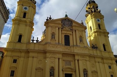 Outside view of Munich's Theatine Church's architecture.