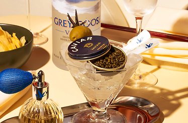 Maison Kaviari caviar on a glass bowl with ice.