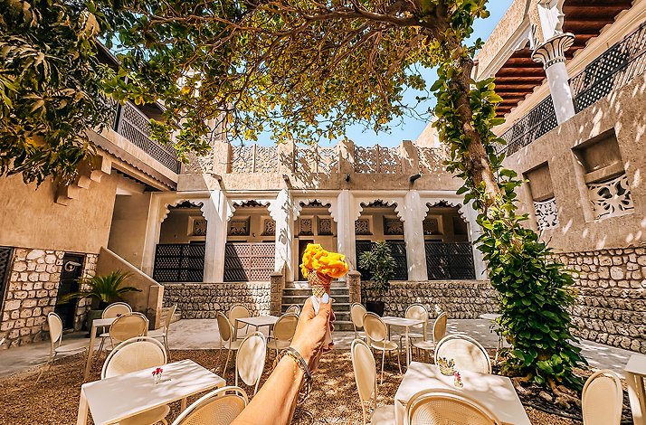 A person holding a gelato at Old Dubai