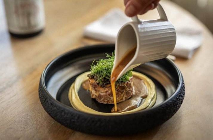 Gourmet dish elegantly served at Luxury Enoresort