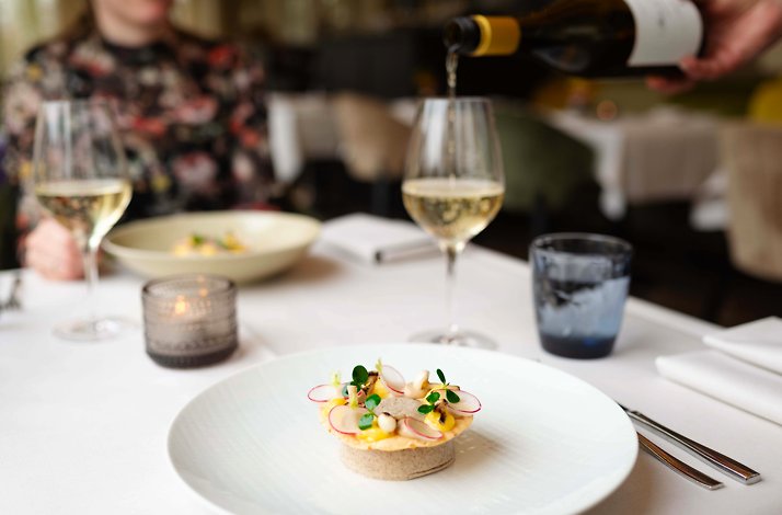 Haute cuisine dishes and wine served at kasteel de vanenburg restaurant