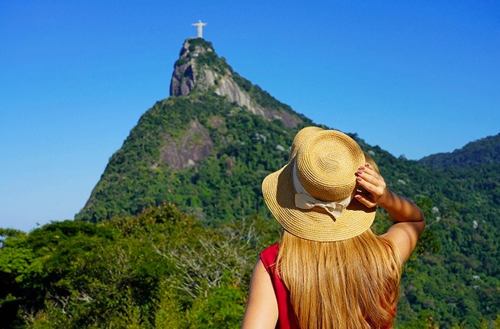 Scenic view of Christ the Redeemer surrounded by lush greenery