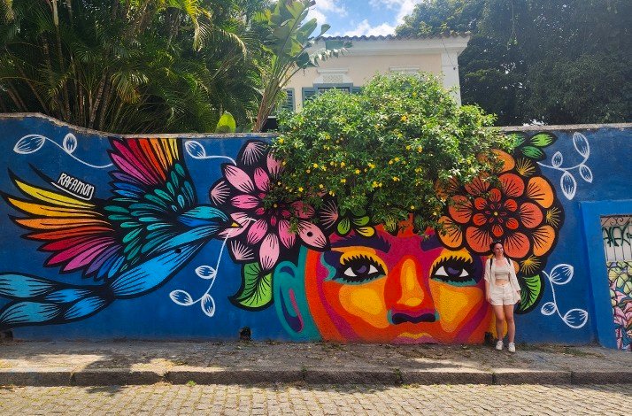 Stunning mural blends nature and portrait art in a colorful outdoor setting