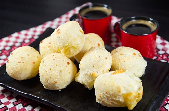 Brazilian pão de queijo served with coffee, not directly related to Morro Dois Irmãos.
