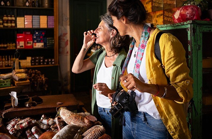 Participants of the food-focused walking tour of Buenos Aires tasting meats