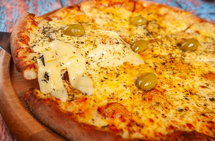 Porteño-style pizza served during the food-focused walking tour of Buenos Aires