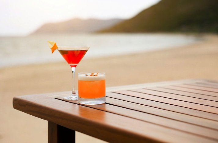 Cocktails on the wooden table on a  Con Dao resort