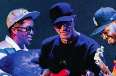 Chris Dave x Pino Palladino x Isaiah Sharkey Trio during concert on stage.