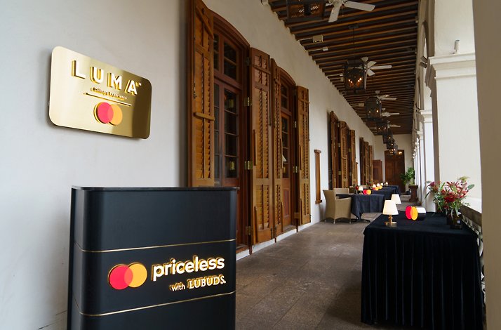 The entrance of LUMA restaurant featuring Priceless logo.