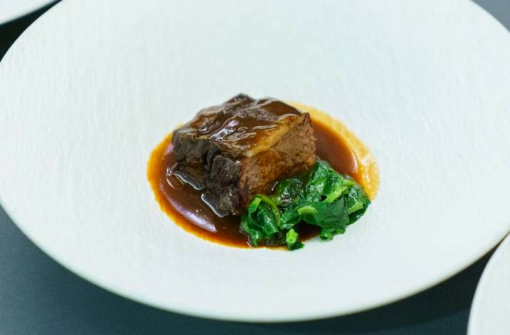 One of the dishes at MIAN is a tender piece of braised beef with rich sauce.