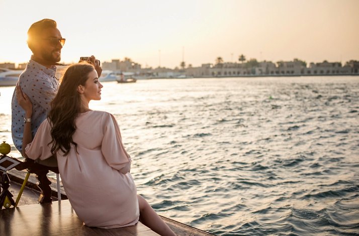 Young couple enjoying sunset on Nile River.