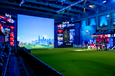 Stage of the Tomorrow Golf League in the Sofi Center.
