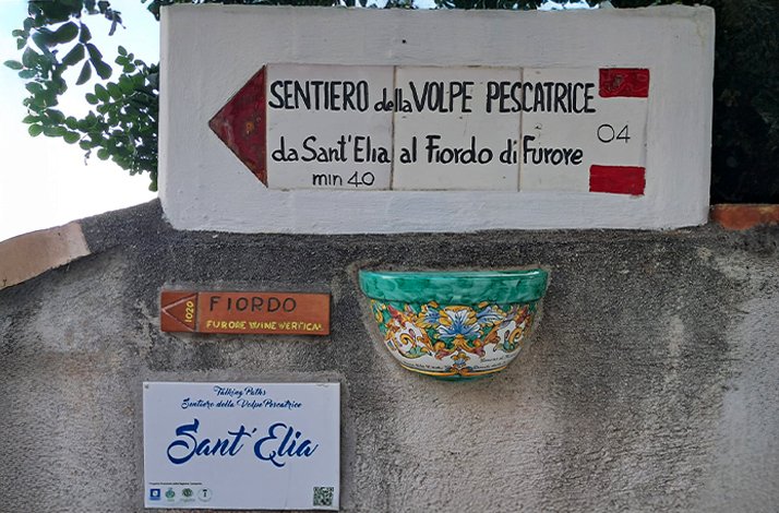  A sign mounted on a wall, displaying important information or directions for viewers.