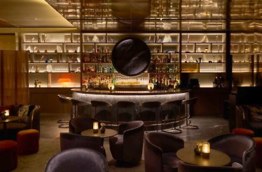 Cozy indoor view of Quin Bar featuring warm lighting and inviting décor.