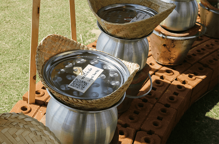 A traditional Thai or Laotian sticky rice steamer set