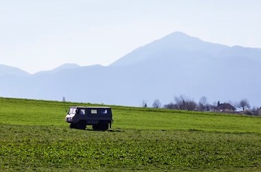 Off-road vehicle driving through the valley at Camping Plitvice.