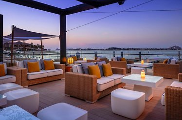 The stylish, lounge-like outdoor seating area at Restaurant 101.