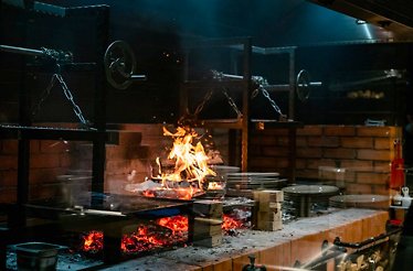 Forged steel grills used at Restaurant 11 Woodfire.