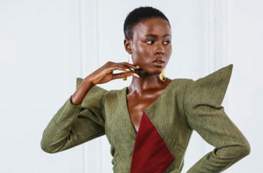 A woman posing in one of the Ghanaian fashion designer`s clothes.