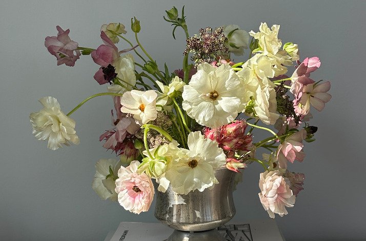 A beautiful arrangement of white flowers by Olivia McDowell.