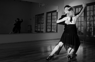 Couple performing the Latin dance at Bachata Studio.