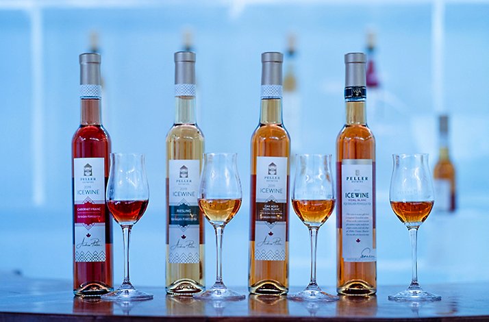 4 bottles of Peller Estates Icewine and wine glasses.