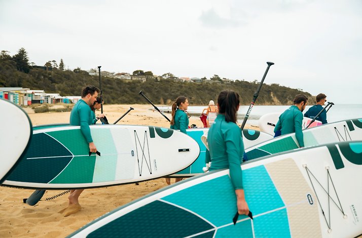 People on the paddleboarding lesson in Mornington Peninsula's largest inland waterway.