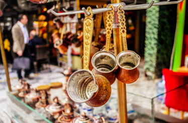 Coffee pots hanging in local market in Turkey