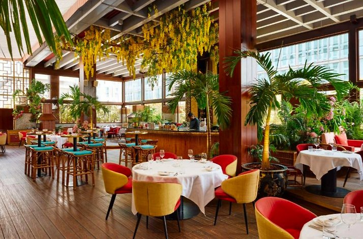 The opulent, art-deco-inspired interior settings of Restaurant Shanghai Me .