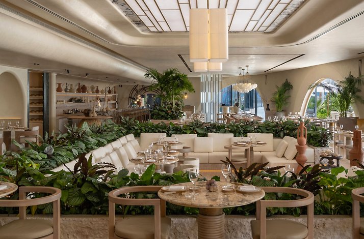 The nature-infused beach front setting of SĀN Beach on West Palm Jumeirah