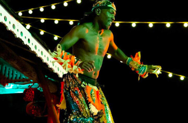 A stilt walker at the Harbour Lights dinner party at Carlisle Bay, Barbados.