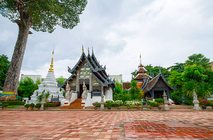 Wat Lok Moli temple with ornate viharn and stupas.