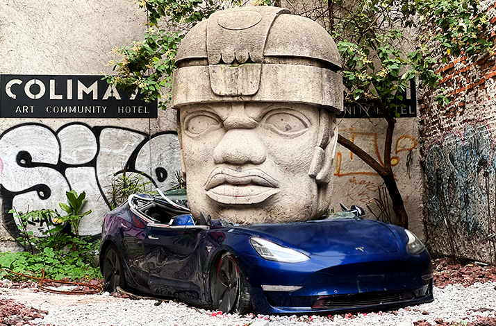 Art installation by the Mexican sculptor Chavis Mármol titled Neo-Ta Meme of a Tesla car with a huge sculpture