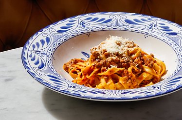 A photo of fresh tagliatelle bolognese