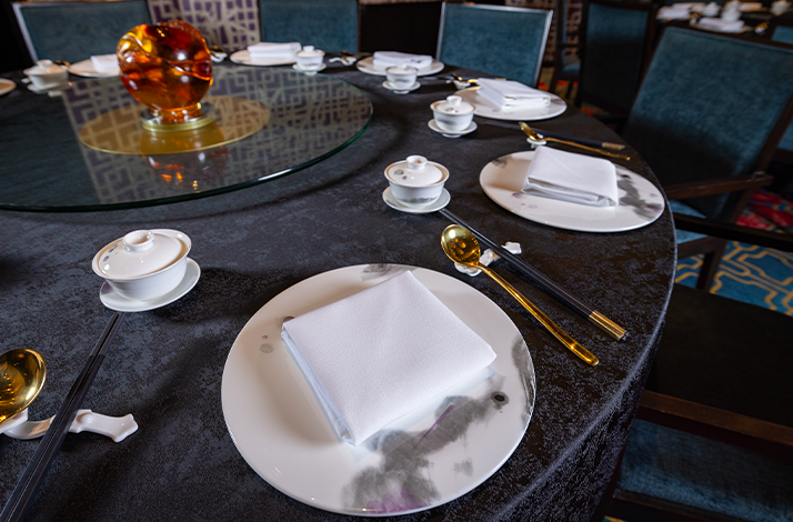 Elegant table setting in a Crystal Dragon.