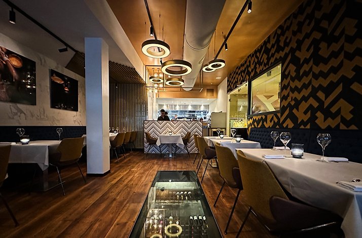 The elegant interior of Michelin-recognized Senses Restaurant.