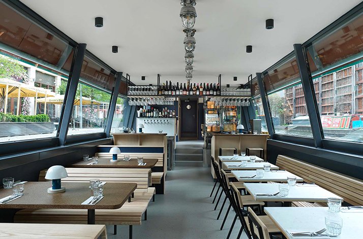 Interior of The Cheese Barge floating restaurant in London
