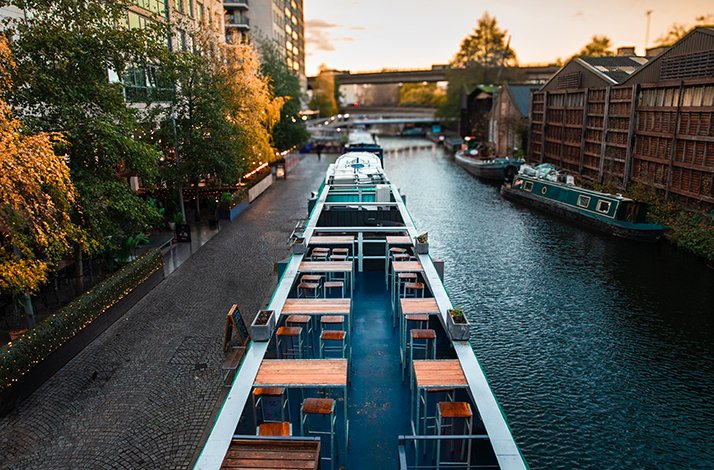 Bird's eye view of Easterby Cheese bar floating in a Canal in London 