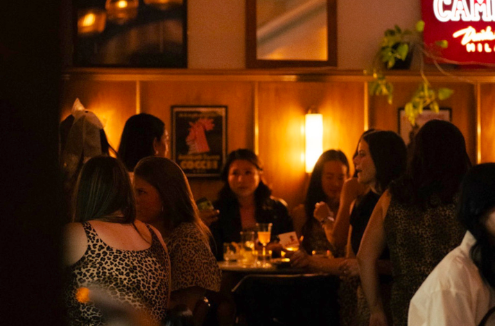 A group of people socialising in Bar Bello, Montréal's favorite aperitivo bar