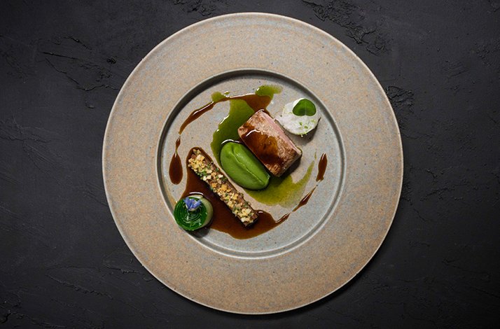 Top view of a delicious meal course served at The Church.