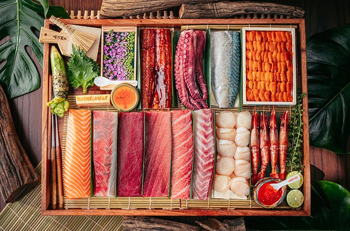 Premium sashimi selection featuring fresh seafood and colorful garnishes.