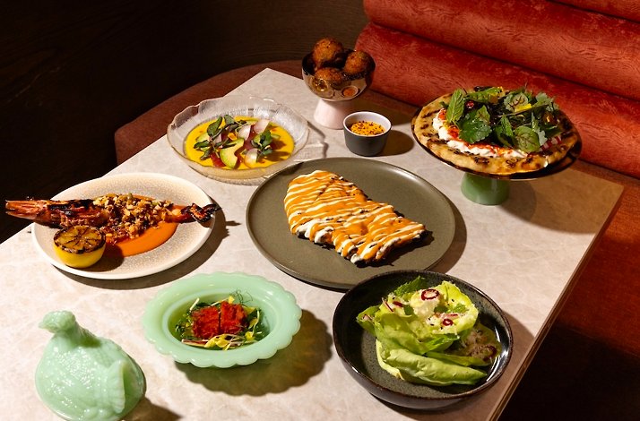 Caribbean-inspired multicourse dishes at immersive dining experience.