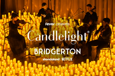 String quartet surrounded by candles. Overlay text says 'Candlelight Bridgerton'.