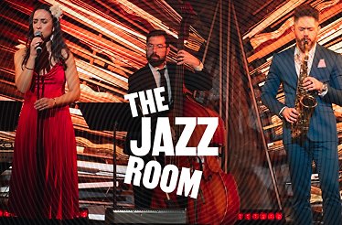 Musicians performing on stage with overlay text 'The Jazz Room'.